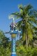 Thailand: A coconut palm overlooks a spirit house near the beach at Ao Thong Nai Pan Yai, Ko Phangan